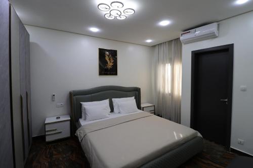 Postel nebo postele na pokoji v ubytování NOVA PREMIUM ROOMs