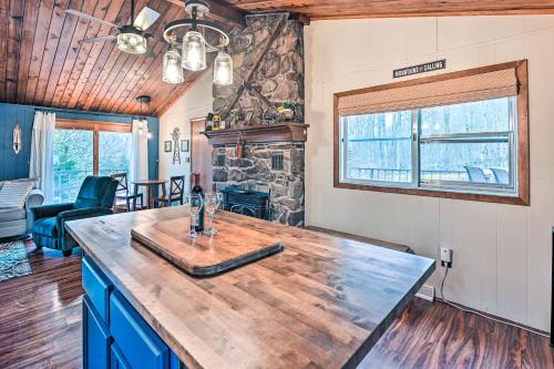 a kitchen with a wooden counter top in a room at Cozy Catskills Escape, 3 Mi to Plattekill Mtn in Roxbury
