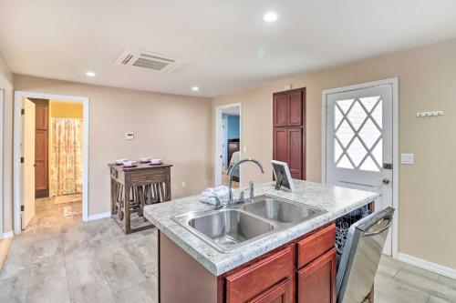 a kitchen with a sink and a counter at Remodeled Harrison Retreat Less Than 6 Mi to Town! in Harrison