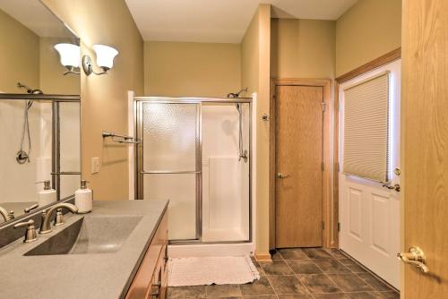 a bathroom with a shower and a sink at Lakefront Romulus Retreat with Private Dock! in Romulus