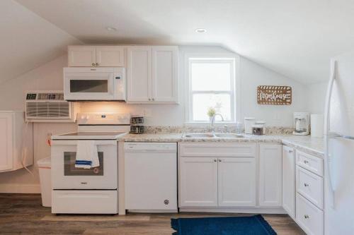 Η κουζίνα ή μικρή κουζίνα στο Charming Apt with chic decor Superhost w 5 Stars