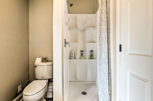 a bathroom with a toilet and a shower at Modest Huntsville Studio with Full Kitchen! in Huntsville