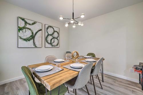 a dining room with a wooden table and chairs at Community Beach and Lake Pocono Summit Escape in Pocono Summit