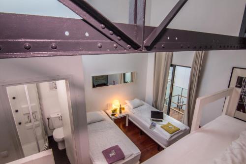 an overhead view of a room with two beds at Lisbon Destination in Lisbon