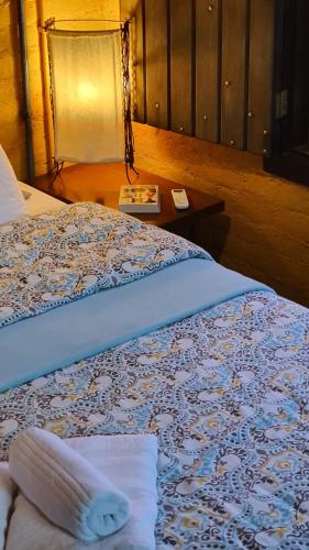 Una cama o camas en una habitación de Loft no campo próximo ao Vale dos Vinhedos