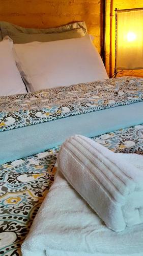 Una cama o camas en una habitación de Loft no campo próximo ao Vale dos Vinhedos
