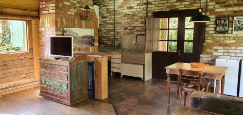 Una cocina o cocineta en Loft no campo próximo ao Vale dos Vinhedos