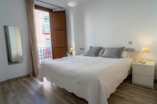 Cama o camas de una habitación en AZZ Sevilla Torre de la Plata