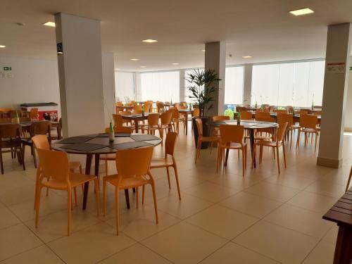 Un restaurante o sitio para comer en Resort Lagoa Eco Towers