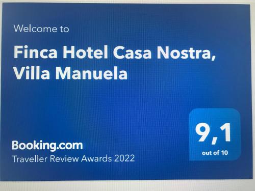 a sign for a hotel casa novasilla with a blue background at Finca Hotel Casa Nostra, Villa Manuela in Quimbaya
