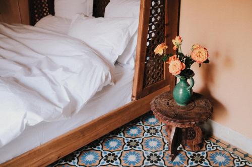 Cama ou camas em um quarto em Riad Maison 24