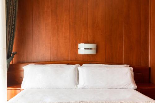 Hotel Alameda Málagaにあるベッド