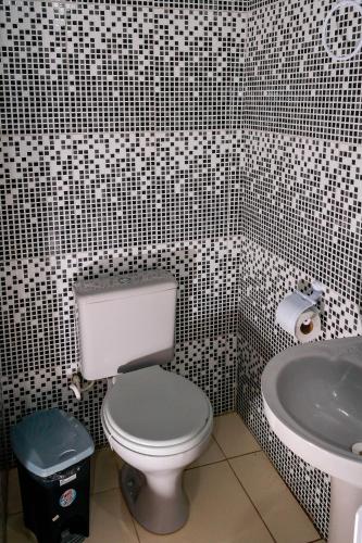 Koupelna v ubytování Pousada Cachoeira da Fumaça