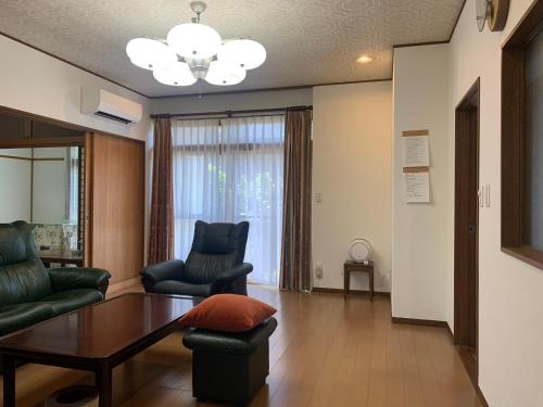 Et opholdsområde på season guest house in nishi shinjuku 100 square meters, 4 bedrooms, 2 living rooms