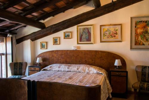Postel nebo postele na pokoji v ubytování Agriturismo La Brezza