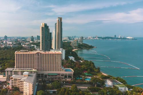 an aerial view of a city and the water at Long Beach Garden Hotel & Pavilions in North Pattaya