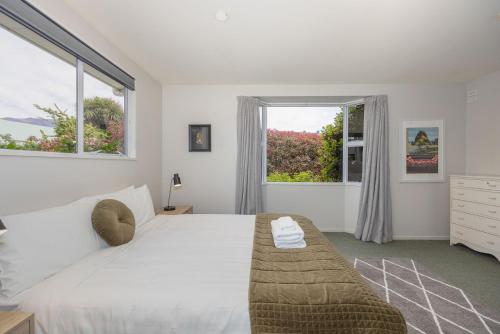 Ένα ή περισσότερα κρεβάτια σε δωμάτιο στο Glenalvon on Achilles