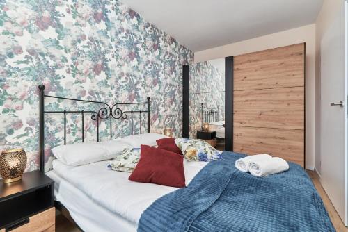 Posteľ alebo postele v izbe v ubytovaní Braniborska Apartment Wrocław by Noclegi Renters