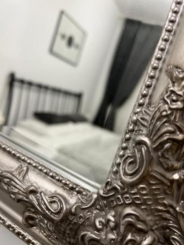 En eller flere senge i et værelse på Apart City Center