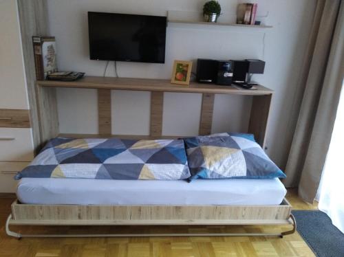 Katil atau katil-katil dalam bilik di Ferienwohnung Leinetal