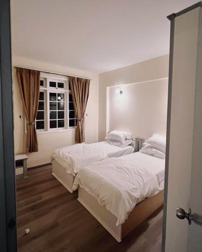 Ένα ή περισσότερα κρεβάτια σε δωμάτιο στο Blossom Silverpark Apartment