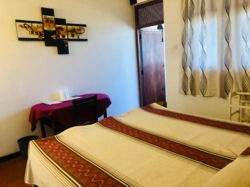 Postel nebo postele na pokoji v ubytování Hotel Hemadan
