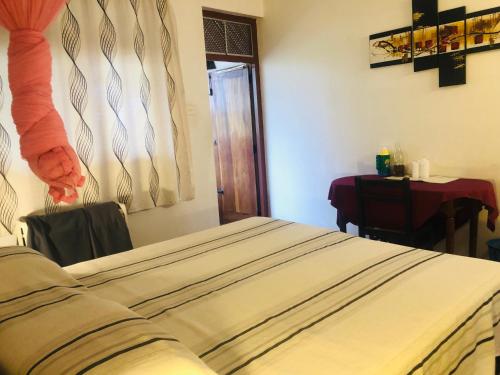 Postel nebo postele na pokoji v ubytování Hotel Hemadan