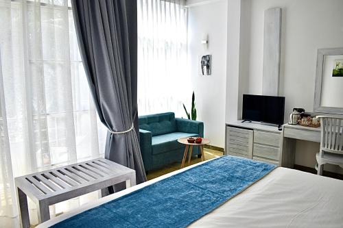 TV a/nebo společenská místnost v ubytování Smeralda Beach Hotel Dikwella