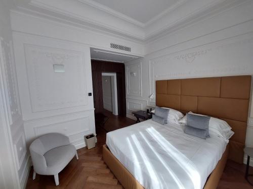 Postel nebo postele na pokoji v ubytování Dimora Palanca Boutique & SPA