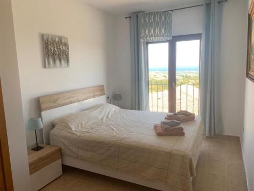 Postel nebo postele na pokoji v ubytování Casa Rafol