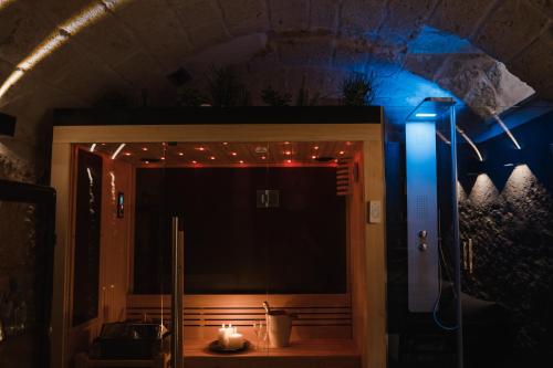 a room with a door with a candle and lights at Suite1212 - Pirrelli in Monopoli