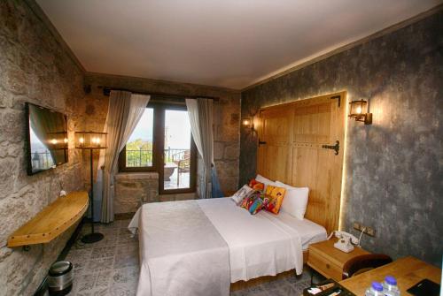 Gallery image of Assos Dionysos Special Class Hotel Adults Only 12 years in Behramkale