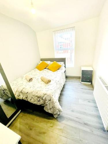 Giường trong phòng chung tại Entrepreneur Stays - 8 Guest house