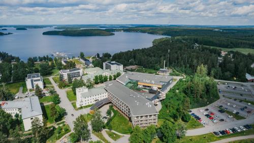 an aerial view of a building next to a lake at Holiday Club Saimaa Superior Apartments in Imatra