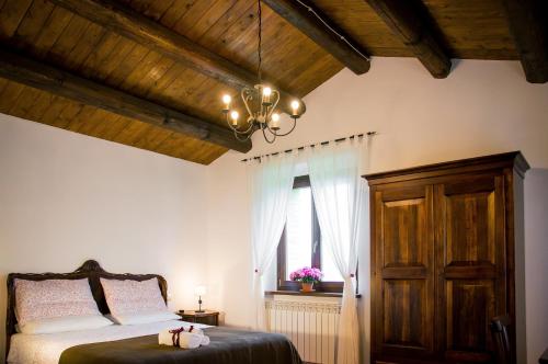 Postel nebo postele na pokoji v ubytování La Finestra sul Conero