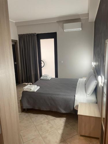 Ένα ή περισσότερα κρεβάτια σε δωμάτιο στο B&B Menna Vence