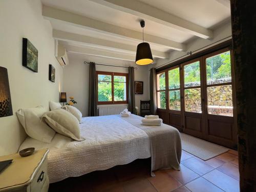 Katil atau katil-katil dalam bilik di Cas Puput Mallorca
