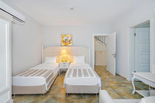 Ένα ή περισσότερα κρεβάτια σε δωμάτιο στο Alya Villa Butik Hotel