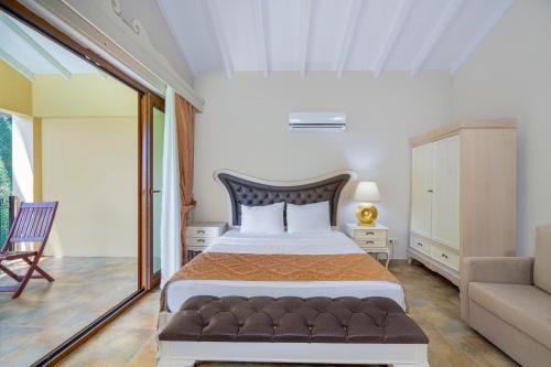 Ένα ή περισσότερα κρεβάτια σε δωμάτιο στο Alya Villa Butik Hotel