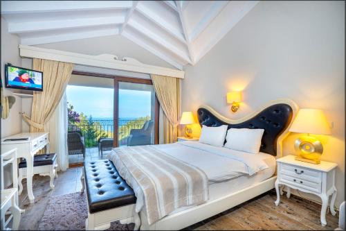 Ένα ή περισσότερα κρεβάτια σε δωμάτιο στο Alya Villa Butik Hotel