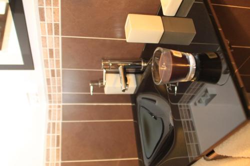 a bathroom with a toilet and a roll of toilet paper at B&B Tra Monti e Mare in Ogliastro Cilento