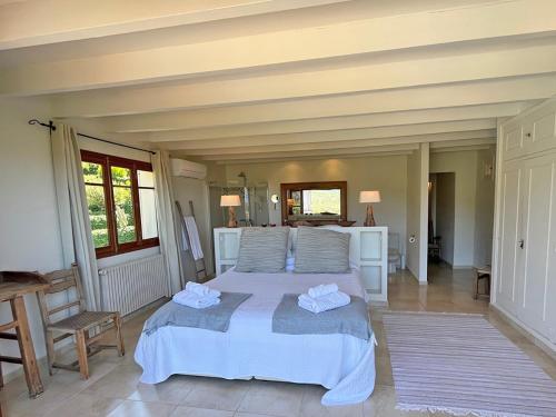 Katil atau katil-katil dalam bilik di Cas Puput Mallorca