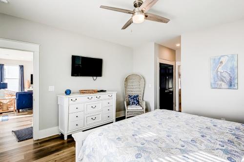 Una cama o camas en una habitación de Blue Wave