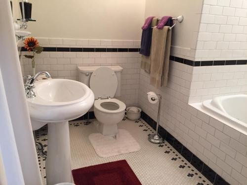a bathroom with a toilet and a sink at Alaska's Capital Inn Bed and Breakfast in Juneau