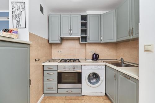 Kuchyňa alebo kuchynka v ubytovaní Family Apartment Szewska Market Square by Noclegi Renters