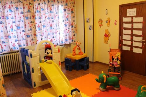 a childs play area with toys in a room at Grand Hotel Principe in Limone Piemonte