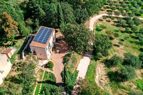 an aerial view of a house with solar panels on the roof at Dream House in Piazza Armerina