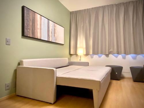Katil atau katil-katil dalam bilik di PAULISTA LA RESIDENCE By Mob Inn JARDINS VAGA METRÔ