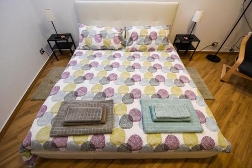a bedroom with a bed with two trays on it at Dream House in Piazza Armerina