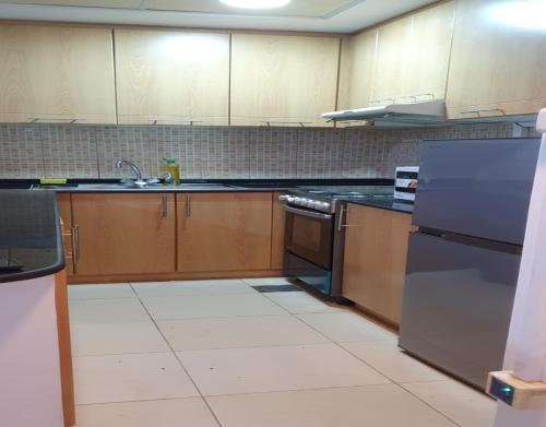 Kuchyň nebo kuchyňský kout v ubytování One Bedroom Furnished Apartment in Business bay Dubai